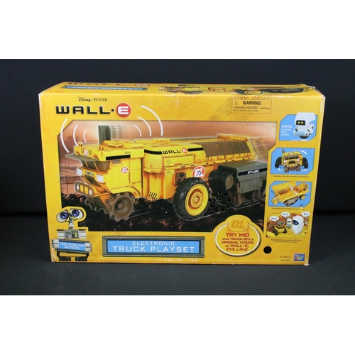 1420 - 34 Carded / boxed Disney figures to include Wall-e, Tomorrowland A World Beyond, Monsters University... 