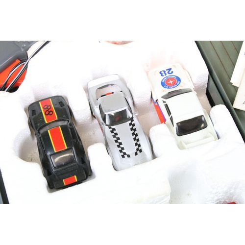 311 - Boxed TCR Slotless Race System with 1 x cased Scalextric Jaguar XKRS (play worn), 5 x Scalextric slo... 