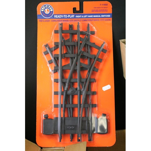 127 - Collection of plastic and metal O gauge track to include 10 x carded Lionel Straight Track sets