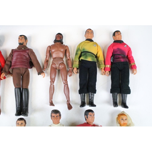 1473 - 13 Mego Tv Related action figures to include Action Jackson, Green Arrow, Star Trek, Superman, Fonzi... 