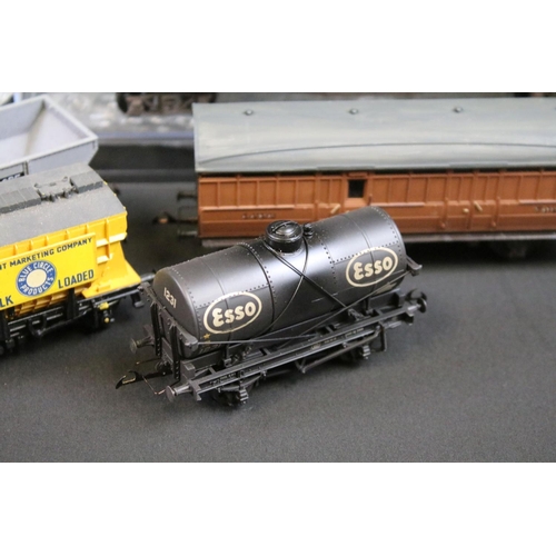 231 - Around 70 OO gauge items of rolling stock with some modification, features wagons, tankers and vans