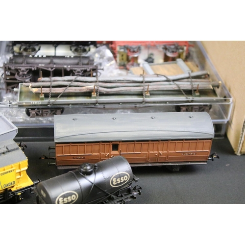 231 - Around 70 OO gauge items of rolling stock with some modification, features wagons, tankers and vans