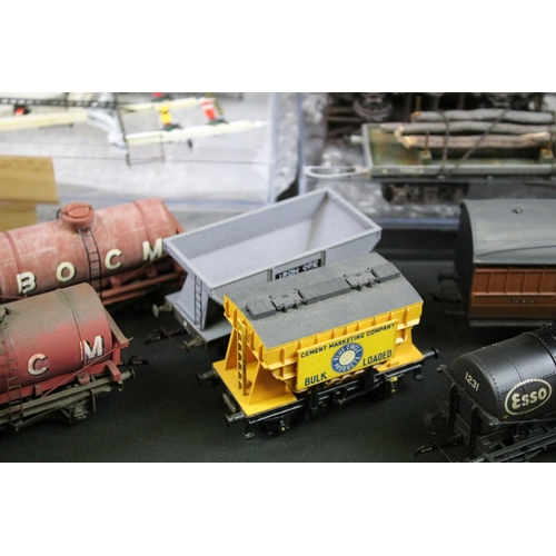 231 - Around 70 OO gauge items of rolling stock with some modification, features wagons, tankers and vans