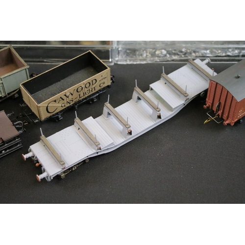 234 - Over 100 OO gauge items of rolling stock, mainly kit built examples featuring coaches, wagons and va... 