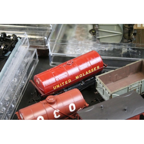 234 - Over 100 OO gauge items of rolling stock, mainly kit built examples featuring coaches, wagons and va... 