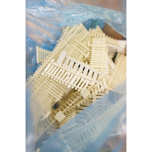 162 - Quantity of OO gauge model railway accessories to include plastic trackside buildings, various track... 