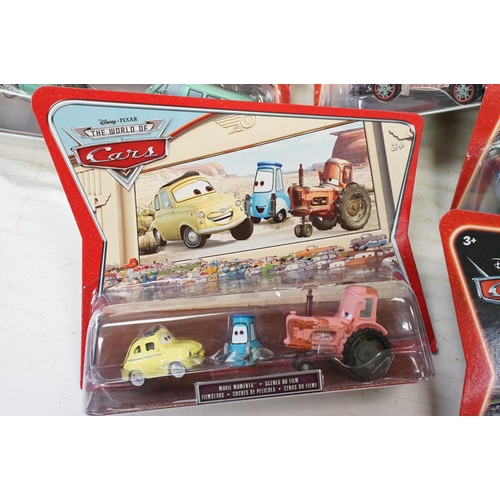 1165 - 20 Carded Mattel Disney Pixar Cars diecast twin pack models to include The World of Cars, all ex, co... 