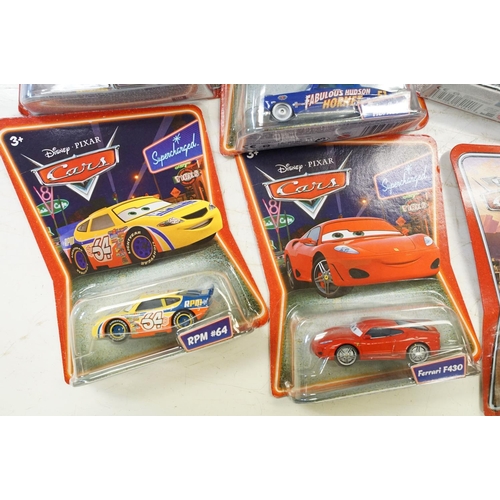 1166 - 57 Carded Mattel Disney Pixar Cars diecast models, all ex, contained within a Cars storage box.