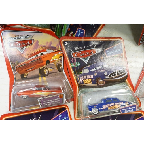 1166 - 57 Carded Mattel Disney Pixar Cars diecast models, all ex, contained within a Cars storage box.