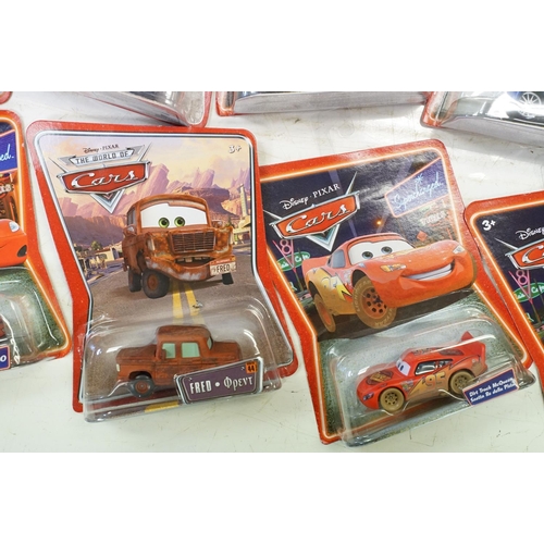 1166 - 57 Carded Mattel Disney Pixar Cars diecast models, all ex, contained within a Cars storage box.