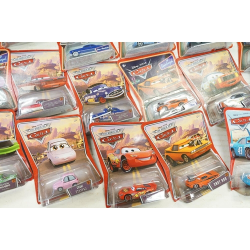 1167 - 57 Carded Mattel Disney Pixar Cars diecast models, all ex, contained within a Cars storage box