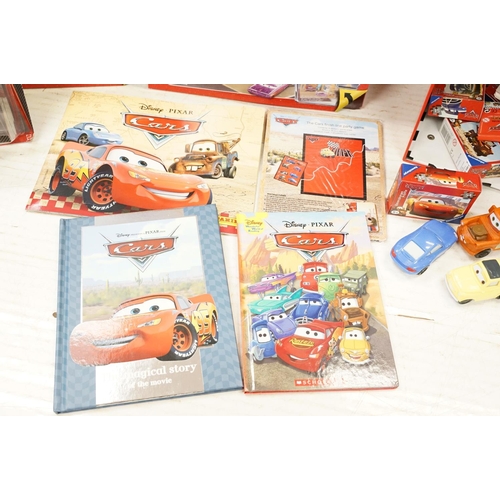 1168 - Collection of Disney Pixar Cars items to include 3 x boxed deluxe diecast models, 3 x Radiator Sprin... 