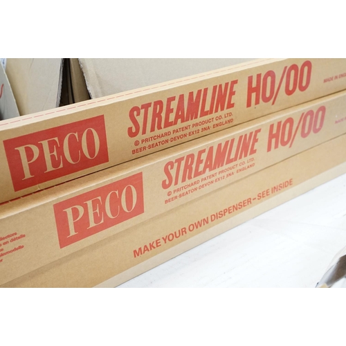 174 - Large quantity of OO gauge model railway track, mainly straights featuring boxed Peco Streamline