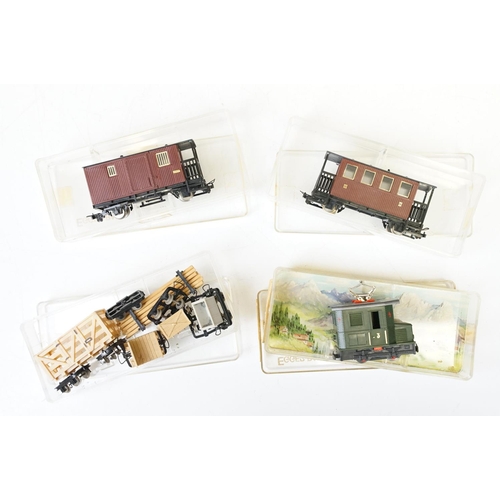 87 - Two cased Egger-Bahn HO 9mm locomotives plus 3 x cased Egger-Bahn items of rolling stock plus a grou... 