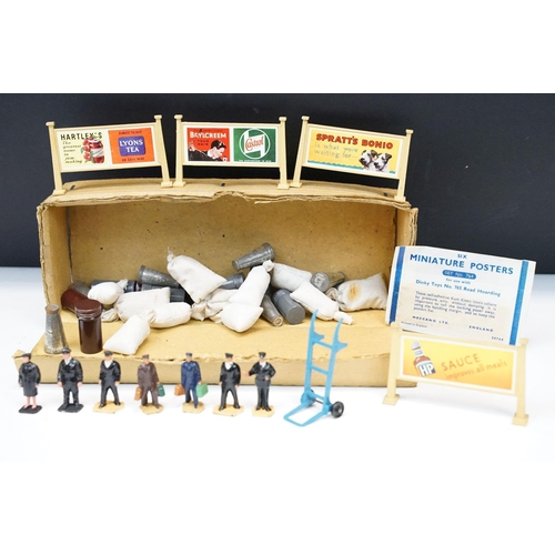 88 - Group of O gauge figures and accessories to include 4 x Hornby Station Advertising Boards, metal sta... 