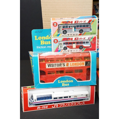 266 - 26 Boxed plastic / metal Friction models featuring buses & trains, vg overall