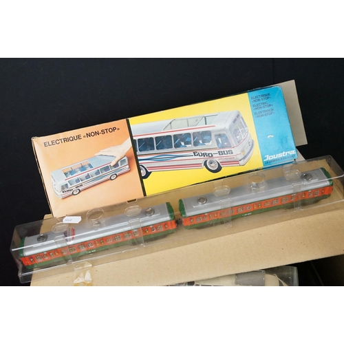 266 - 26 Boxed plastic / metal Friction models featuring buses & trains, vg overall