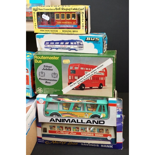 266 - 26 Boxed plastic / metal Friction models featuring buses & trains, vg overall