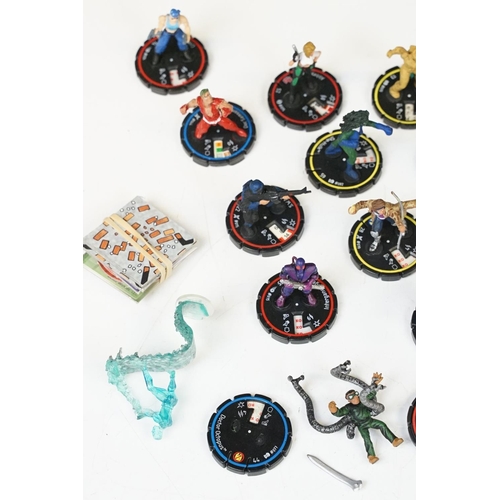 267 - 39 HeroClix figures to include Spiderman, Black Cat, Abbey Chase, Hand Ninja, Kang, etc plus a Marve... 