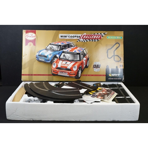 277 - Boxed Scalextric Hamley's Mini Cooper Challenge set, limited edition with COA No. 360/1500, all appe... 