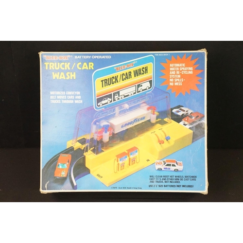 278 - Collection of four boxed toys and games to include Matchbox Gearshift Garage Electro Service Center,... 