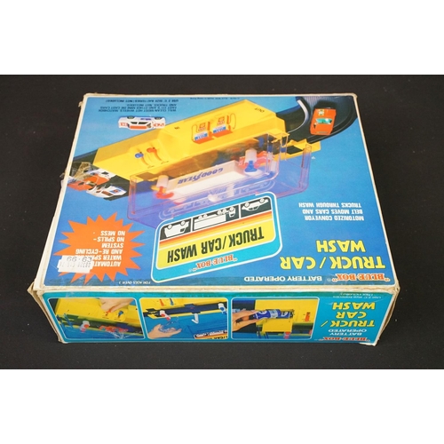 278 - Collection of four boxed toys and games to include Matchbox Gearshift Garage Electro Service Center,... 