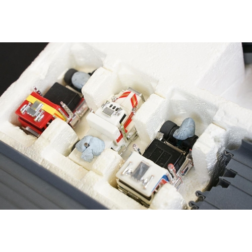 279 - Collection of various slot cars and racing games to include Scalextric cars featuring red Mini, Rove... 