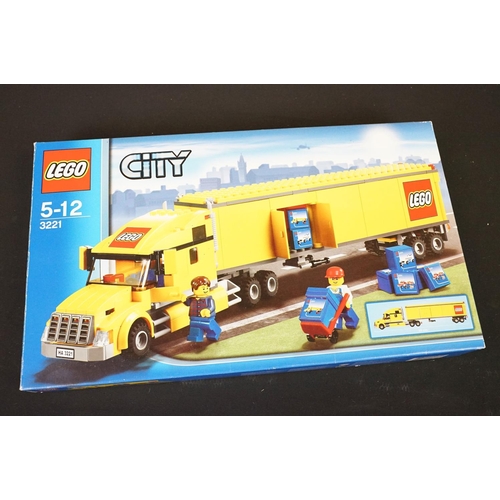 293 - Collection of various toys to include 2 x boxed Lego City sets to include 3180 and 3221 (Both built,... 