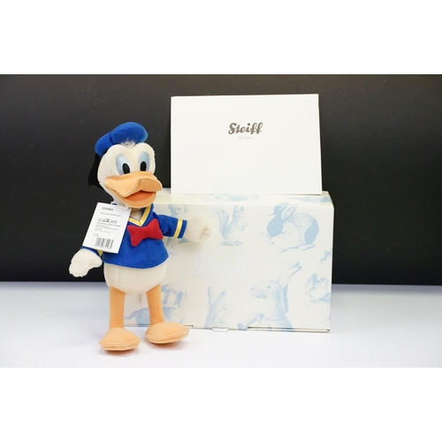 320 - Two boxed Steiff Disney teddys to include 354984 25cm Donald Duck No.573/2000, Exclusive to Danbury ... 