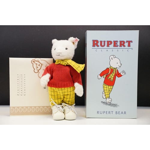 322 - Four boxed Steiff Rupert Bears to include Bill Badger no.543, Rupert Bear no.1387, Edward Trunk no.1... 