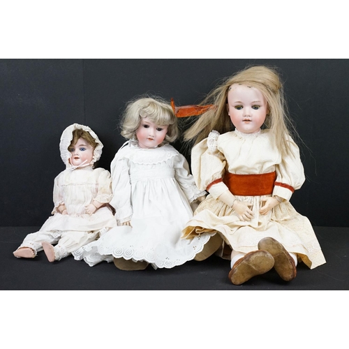 344 - Three Armand Marseille early 20th Century bisque headed porcelain dolls. Two having sleeping eyes an... 