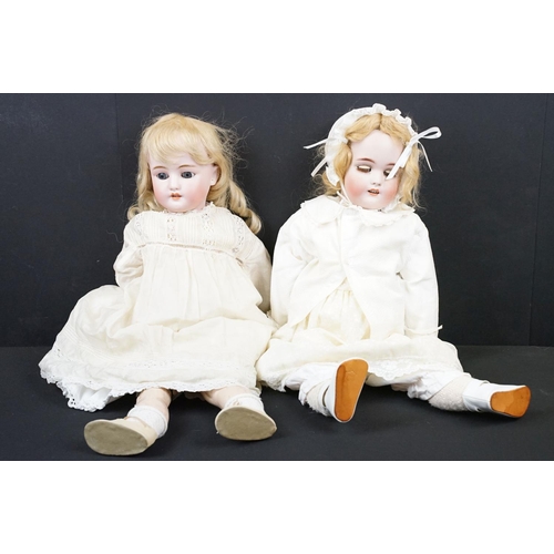 345 - Two early 20th Century Simon & Halbig bisque headed child dolls, both having sleeping eyes, teeth an... 