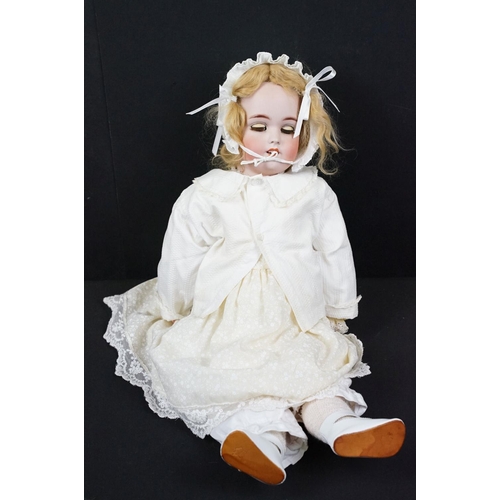 345 - Two early 20th Century Simon & Halbig bisque headed child dolls, both having sleeping eyes, teeth an... 