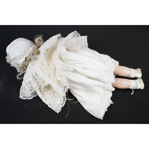 347 - Two early 20th Century bisque headed dolls both with sleeping eyes, teeth and hand painted details. ... 