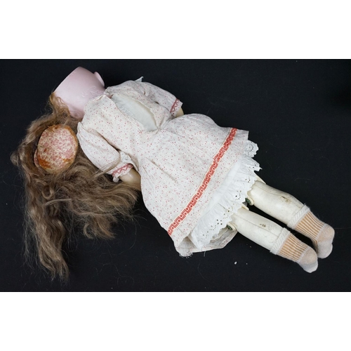 349 - Three late 19th / early 20th Century porcelain headed child dolls, two having sleeping eyes, all wit... 