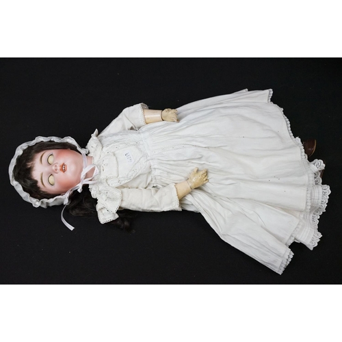 350 - Two late 19th / early 20th Century bisque headed dolls having composite bodies, teeth and hand paint... 