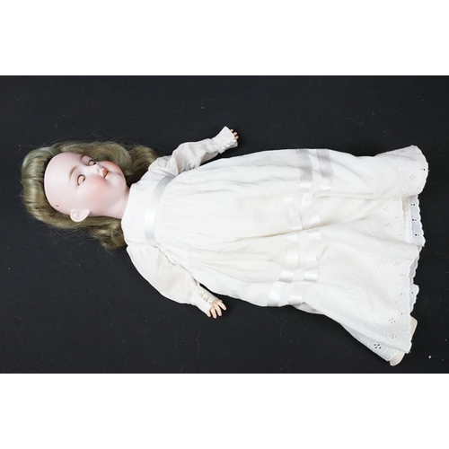 350 - Two late 19th / early 20th Century bisque headed dolls having composite bodies, teeth and hand paint... 