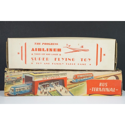 353 - Two boxed tin plate model toys to include Technofix Bus Terminal in original box and missing both en... 