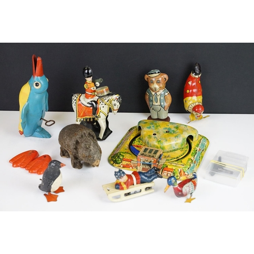 355 - Collection of nine 1950s onwards tin plate clockwork mechanical windup lithograph models to include ... 