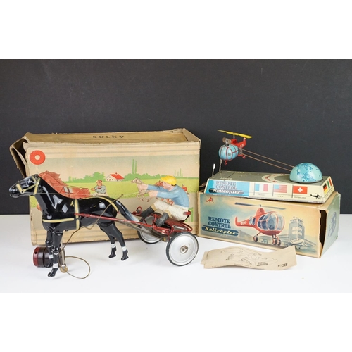 356 - Two boxed mid 20th C tin plate toys to include Sulky (Brevetti  Boroli Bologna, Italy) horse with jo... 