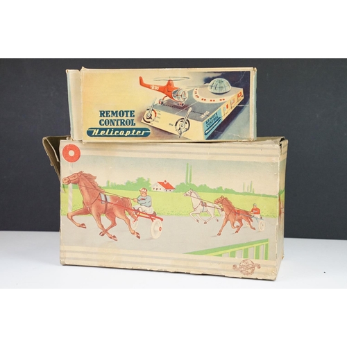 356 - Two boxed mid 20th C tin plate toys to include Sulky (Brevetti  Boroli Bologna, Italy) horse with jo... 