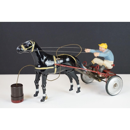 356 - Two boxed mid 20th C tin plate toys to include Sulky (Brevetti  Boroli Bologna, Italy) horse with jo... 