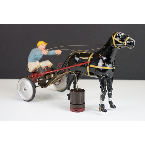 356 - Two boxed mid 20th C tin plate toys to include Sulky (Brevetti  Boroli Bologna, Italy) horse with jo... 