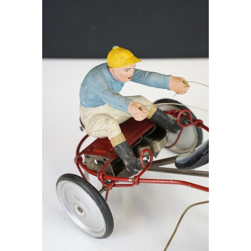 356 - Two boxed mid 20th C tin plate toys to include Sulky (Brevetti  Boroli Bologna, Italy) horse with jo... 