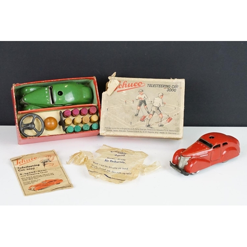 358 - Boxed Schuco Telesteering Car set with green tin plate clockwork 3000 car, complete with accessories... 