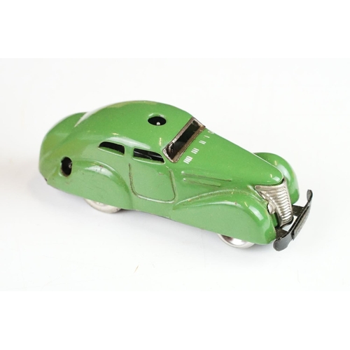 358 - Boxed Schuco Telesteering Car set with green tin plate clockwork 3000 car, complete with accessories... 