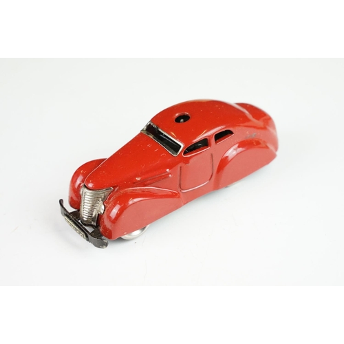 359 - Boxed Schuco clockwork tin plate Telesteering Car 3000 in red with accessories and instructions, mis... 