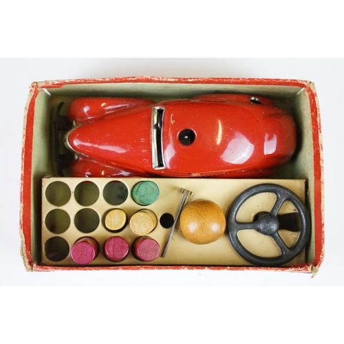 359 - Boxed Schuco clockwork tin plate Telesteering Car 3000 in red with accessories and instructions, mis... 