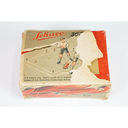 359 - Boxed Schuco clockwork tin plate Telesteering Car 3000 in red with accessories and instructions, mis... 