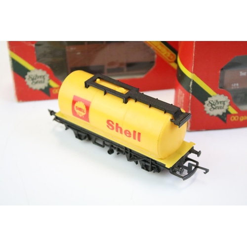 23 - 29 Boxed OO gauge items of rolling stock to include 27 x Hornby and 2 x Palitoy Mainline, featuring ... 